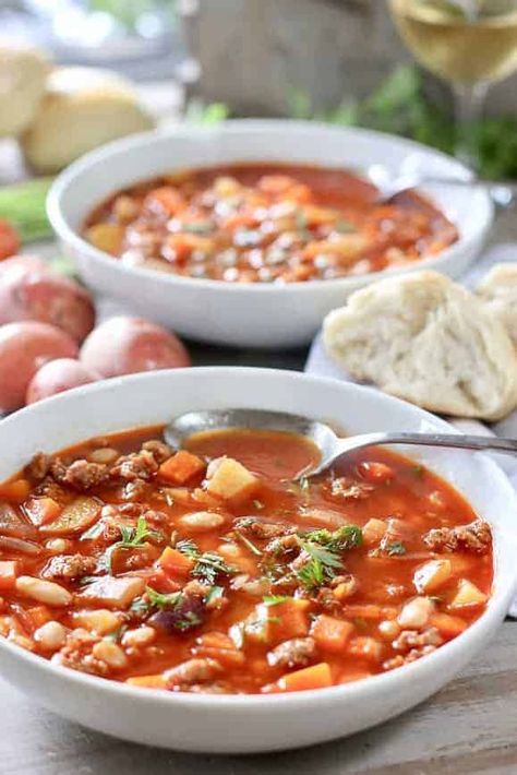 This Chorizo and White Bean soup comes together in less than 30 minutes and has a ton of flavor! #30minutesoup #healthysoup #easysoup Recipes With Chirozo, Chirozo Recipes, Chorizo And Bean Stew, Chorizo Soup Recipes, Chorizo Recipes Dinner, Chorizo Soup, Soup Ideas, Chorizo Recipes, White Bean Salad