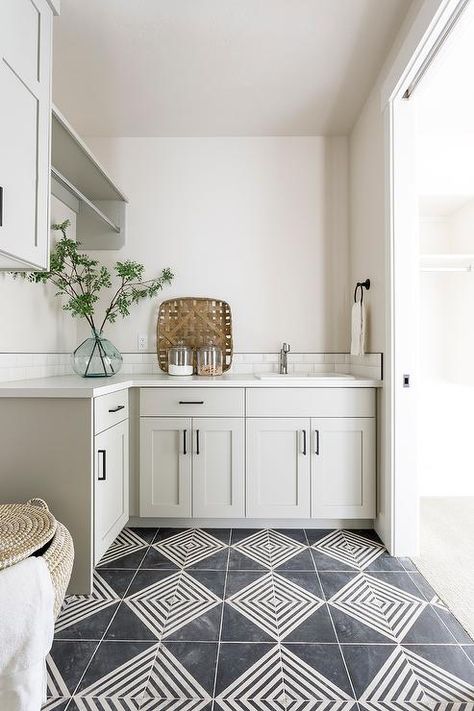 Light Gray Laundry Room Cabinets with Black and White Geometric Floor Tiles - Transitional - Laundry Room Room Tiles Floor, Black And White Tile, Grey Laundry Rooms, Laundry Room Tile, White Laundry Rooms, Stylish Laundry Room, Dream Laundry Room, Laundry Room Flooring, Geometric Floor