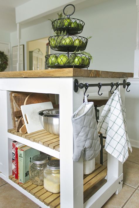 DIY Kitchen Island with shelves and built in trash compartment, downloadable plans. I am not big on the tilt out trash bin because full bags can be tough to get out, but a nice looking design. Shelves Under Kitchen Island, Towel Bar On Kitchen Island, Diy Kitchen Trolley, Kitchen Trolly Ideas, Kitchen Island With Trash Storage, Kitchen Trolley Ideas, Island With Shelves, Ikea Rail, Cakes Videos