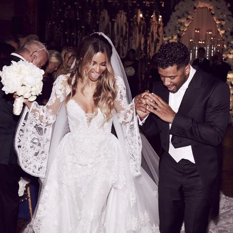 What did your favorite black celebrity wear on their wedding day? We ade this gallery of 20 black celebrity wedding dresses. This post is for you if you are still looking for inspiration for your wedding dress. Celebrity Wedding Dress| Black celebrities| Black Hollywood Wedding| Black Wedding | African Wedding |Wedding Fashion #fashion #blackwedding #weddingdress #ghanawedding #weddingfashion #ukwedding #blackbrideuk #unitedkingdom #womenfashion #nigeria #ghana #Weddingoutfit #womenfashion Ciara Wedding, Celebrity Wedding Hair, Ciara Wilson, Melissa Satta, Ciara And Russell Wilson, Ciara And Russell, Celebrity Bride, Chica Cool, Celebrity Wedding Dresses