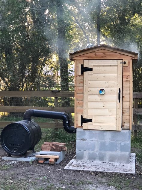 My 1st attempt at a backyard Smokehouse. Backyard Smokehouse, Diy Smokehouse, Homemade Smoker Plans, Fire Pit Oven, Outdoor Barbeque Area, Barbeque Area, Backyard Smokers, Build A Smoker, Homestead Skills