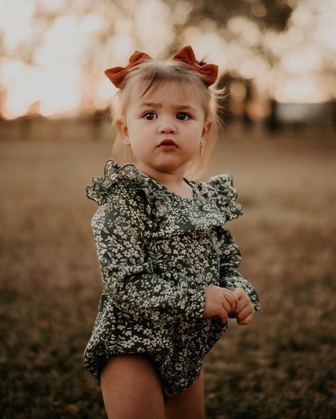 Ruffle Bubble Romper GOALS! The Rhodes is officially a seasonal staple. Complete with everything we love for fall: ruffles, bubbles, muted colors & more, she stands out and holds up to any trendy piece for your infants & toddlers! The lightweight fabric dresses up the onesie style and when paired with a fringed Toddler Girl Romper, Matching Clothes, October 2022, Romper Outfit, Bubble Romper, Girls Rompers, Center Stage, Toddler Fashion