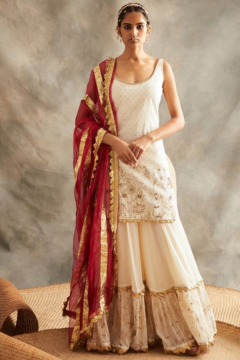 Featuring a white kurta in silk chanderi base with dabka and zardosi embroidery. It is paired with matching sharara pants and a contrasting red organza dupatta.  FIT: Fitted at bust and waist. COMPOSITION: Silk chanderi, Organza. CARE: Dry clean only. White Sharara, Kurti With Sharara, White Kurti, Sharara Designs, Kurta Sharara Set, Kurta Sharara, White Kurta, Indian Dress, Sharara Set