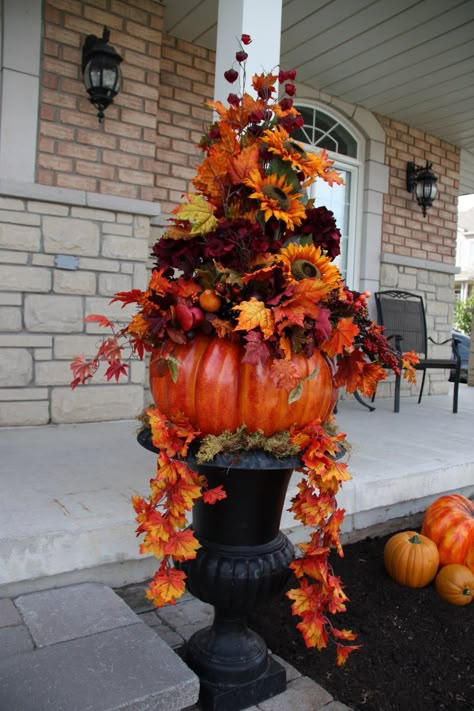 Before the weather starts getting colder, I thought it would be a good idea to cleaned out my gardens this weekend. I purchased these two fa... Fall Urn, Outside Fall Decor, Fall Leaf Garland, Festa Harry Potter, Plastic Pumpkins, Fall Planters, Fall Deco, Fall Thanksgiving Decor, Autumn Decorating