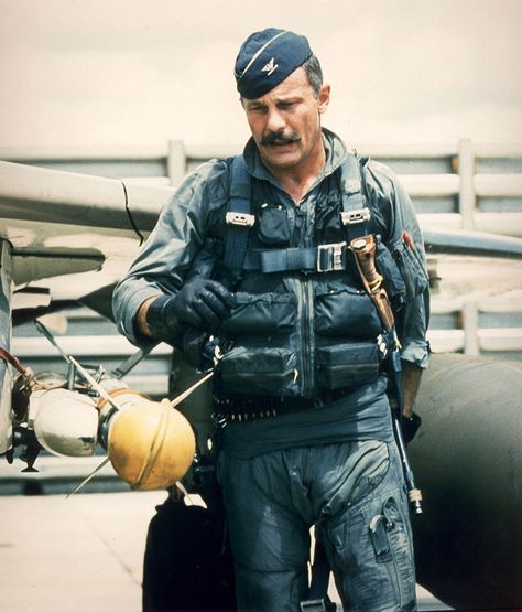 Robin Olds (July 14, 1922 – June 14, 2007) was an American fighter pilot and general officer in the U.S. Air Force. He was a "triple ace", with a combined total of 16 victories in World War II and the Vietnam War. He retired in 1973 as a brigadier general. Gen. Olds flew P-38's, P-51's, F-86A Sabres, & F-4C Phantom's, Robin Olds, Man In Uniform, F4 Phantom, American Fighter, Military Heroes, Fighter Pilot, United States Air Force, Older Fashion, Men In Uniform