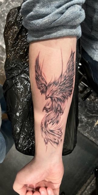 phoenix tattoo, mystical tattoo, rebirth tattoo, black and grey tattoo, meaningful tattoo, bird tattoo, realistic ficion tattoo Bird Tattoo Realistic, Phoenix Forearm Tattoo, Rebirth Tattoo, Tattoo Meaningful, Tattoo Black And Grey, Mystical Tattoos, Tattoo Bird, Flying Tattoo, Black And Grey Tattoo