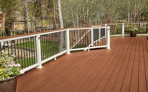 This backyard beauty built with Trex Enhance decking in Saddle and Trex Transcend railing will never go out of style. Trex Deck Stairs, Trex Transcend, Composite Deck Railing, Cedar Deck, Composite Decking Boards, Deck Colors, Deck Installation, Deck Construction, Deck Stairs