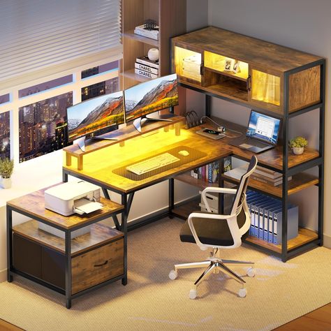 PRICES MAY VARY. Reversible Desk: This L Shaped Desk with bookshelf can be installed as a left L shaped desk or a right L-shaped desk according to your needs, good choice for your living room, study and office. This corner office desk is reversible, you can place the 7-tier bookshelf on right side or left side, the L desk design suits for corner space perfectly Convenient Charging Station: This L shaped desk with drawers features 2 USB ports, 4 power outlets & a 6.56ft power cord to charge your Computer Desk In Living Room, L Desk Setup, Gamer Office Ideas, Corner Office Desk, Bookshelf Corner, Shelves For Home Office, Drawer Bookshelf, Desk With Led Lights, Computer Desk With Drawers