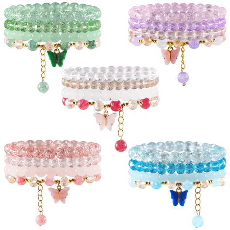 PRICES MAY VARY. [ Package You Can Get ] It comes with 20 pieces crystal beaded bracelets with 5 different styles and colors in total, sufficient quantity and styles to meet your different decorating needs. And butterfly charms and gold beads, butterfly jewelry makes a beautiful and unique addition to any jewelry collection and it goes with just about anything. [ Adorable Design ] These beaded bracelets are strung with beads, and there was a butterfly and a chakra charm on it, it has an elastic Pretty Jewellery Bracelets, Clear Bracelets, Gold Beads Jewelry, Beads Butterfly, Clear Bracelet, Bracelet Butterfly, Mom Bracelet, Chakra Beads, Moms Bracelet