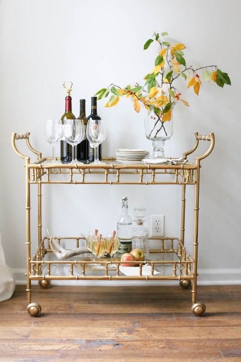 Bring in fresh flowers and fruit when styling your bar cart as seen on Bazaar Brass Bar Cart, Diy Bar Cart, Gold Bar Cart, Outside Bars, Bar Cart Styling, Bar Designs, Mini Bars, Beautiful Bars, Bar Cart Decor