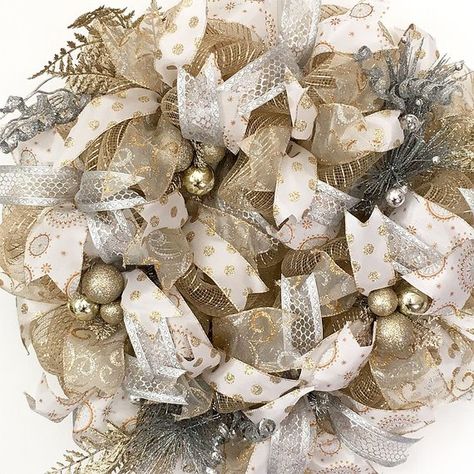 Gold Silver White Deco Mesh Christmas Wreath has an elegant ambiance in champagne gold, silver and white utilizing a gold metallic deco mesh and decorated with silver and champagne gold picks, glitter leaves, ornament balls, and silver curly picks. I have added loads of textured, Deco Mesh Christmas Wreath, Mesh Christmas Wreath, Glamorous Christmas, White Christmas Wreath, Silver Christmas Decorations, Glitter Leaves, Deco Mesh Christmas Wreaths, Christmas Mesh Wreaths, Fall Wall Decor