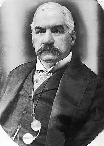 Financier J.P. Morgan believed in the consolidation of industries to lessen competition and enhance stability. He did this for railroads, shipping, utilities, and most famously, the steel industry. In 1907 he stopped a financial panic in the banking system by injecting his own money, and coordinating the actions of the important banks, similar to the role of the Federal Reserve. JC Ragtime Musical, J P Morgan, Banking Industry, Morgan Library, Picture Albums, Federal Reserve, History Class, J P, Gilded Age