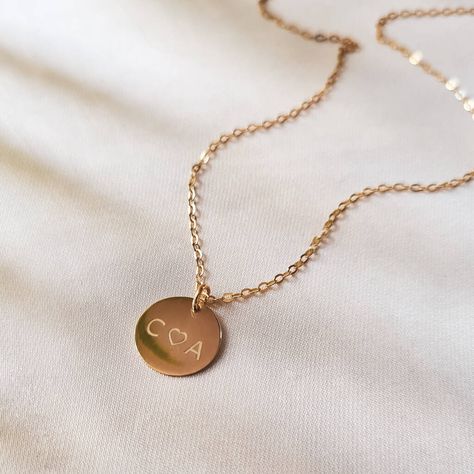 A delicate polished disc pendant personalised with the initial of your choice and hung from a fine silver chain. The perfect gift for an Anniversary or Mothers day. Your two initials, the initials of the kids - whoever you hold close this is the perfect everyday pendant. Initials and a heart make this simple design really special. Hung from a sparkling trace chain that is adjustable between 16 and 18 inches. Packaged in our beautiful card envelope boxes which fit through letterboxes making them Thumbprint Jewelry, Jewellery Minimalist, Everyday Pendant, Initial Heart Necklace, Fingerprint Necklace, Fingerprint Jewelry, Necklace Love, Disc Pendant, Initial Jewelry