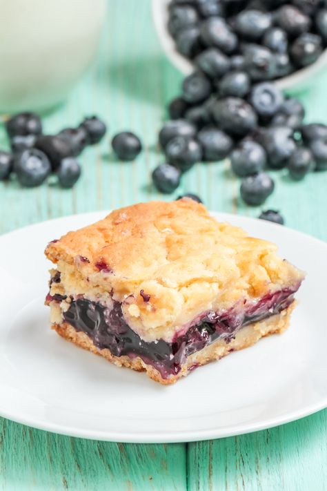 Made with cake mix and pie filling, this blueberry cream cheese bars recipe is a delicious and easy dessert that is perfect for any occasion! Blueberry Cream Cheese Bars, Cake Mix And Pie Filling, Cheese Bars Recipe, Blueberry Pie Filling Recipes, Blueberry Cream Cheese Pie, Pie Filling Desserts, Cream Cheese Bars Recipe, Dessert Bars Recipes Easy, Blueberry Cream Cheese Muffins