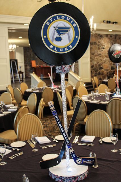 Hockey centerpiece Hockey Centerpieces Banquet, Hockey Bar Ideas, Hockey Centerpieces, Hockey Wedding Theme, Hockey Decorations, Sports Themed Centerpieces, Hockey Banquet, Balloons Centerpieces, Sports Centerpieces