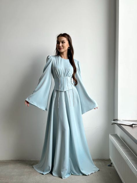 Modest dresses are making a comeback in the fashion world and we couldn't be more excited! From flowy maxi dresses to elegant midi styles, there's a modest dress for every occasion. #ModestFashion #DressGoals #ElegantStyle #FashionRevival #ModestIsHottest #DressToImpress #ModestDresses" Dress Korea Hijab, Hijab Bridesmaid Dress, Hijab Bridesmaid, Aesthetic Hijab, Classy Party, Dress Korea, Formal Clothes, Modest Dresses Fashion, Party Fits