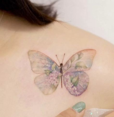 Lilac Tattoo Meanings - A Complete Guide Floral Watercolor Tattoo, Watercolor Butterfly Tattoo, Lilac Tattoo, Wrist Tattoo Designs, Tattoo Meanings, Butterfly Tattoos For Women, Tattoos For Women Flowers, Small Pretty Tattoos, Tasteful Tattoos