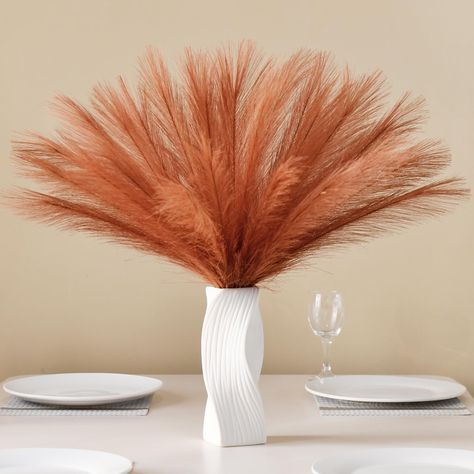 PRICES MAY VARY. 𝙋𝙖𝙢𝙥𝙖𝙨 𝙂𝙧𝙖𝙨𝙨 𝘽𝙪𝙡𝙠: We have 30 pieces of artificial pampas grass in a package. You can decorate at 3 rooms with 30 pieces of faux pampas grass. These pampas decor has a total length of 17 inch, length of the stem part is 3.9 inch, length of the feather part is 13.4 inch 𝙋𝙖𝙢𝙥𝙖𝙨 𝙂𝙧𝙖𝙨𝙨 𝘾𝙤𝙡𝙤𝙧: This pampas grass is orange. We have a variety of styles for you to choose to apply for lots of scenarios. The stylish and fluffy gradient feather can add a disti Pampas Decor, Pampas Grass Vase, Faux Pampas, Fall Orange, Grass Decor, Pampas Grass Decor, Vase Fillers, Boho Home, Room Hallway