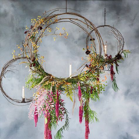 Hanging circle taper holders by Terrain; from $38. shopterrain.com Art Floral Noel, Anthropologie Holiday, Decoration Evenementielle, Christmas Window Display, Fleur Design, New Years Eve Decorations, Christmas Window, Deco Floral, The Ceiling