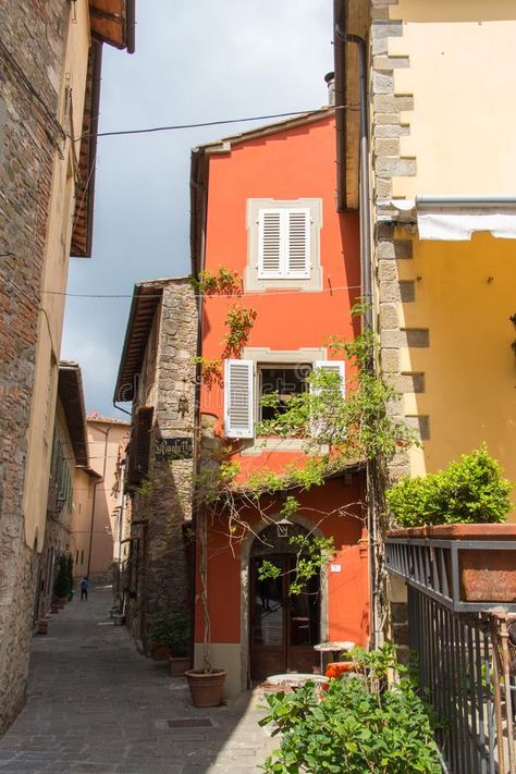 Narrow street and facade fragment of typical Italian house, Tuscany, Italy. The view of a narrow street and typical Italian house facade fragment in a sunny day stock images Narrow Streets Italy, Small Italian House, Italian House Aesthetic, Italian Buildings, Italy Houses, Italy Apartment, Dream House Aesthetic, Narrow Street, Townhouse Exterior