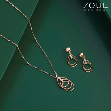 The Sun will envy you, the Moon looks up to you. Day or night, you will shine with this simple and graceful set, from Zoul, perfect as you. Explore the collection at Malabar Gold & Diamonds. ​ #ZoulByMalabar #EverChanging #EverShinning #EverdayJewllery #FineJewllery #ZoulForYou #Jewllery #JewlleryLover #JewelleryAddict #Earring #Necklace #Diamonds #MalabarGoldAndDiamonds Pendle Set Gold Design, Pendent Set Gold Light Weight, Light Weight Gold Pendant Set, Minimal Jewelry Design, Moon Accessories, Real Diamond Earrings, Creative Jewelry Photography, Diamond Jewelry Earrings, Diamond Pendants Designs