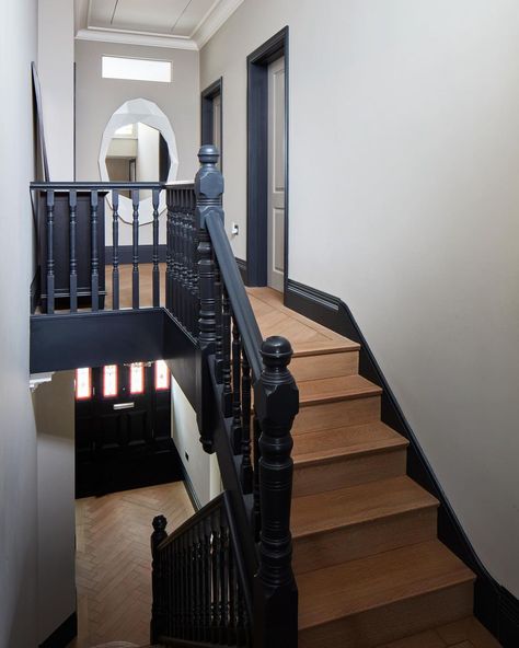 Navy Bannister Rail, Dark Stairway Ideas, Black Bannister Ideas, Refurbished Staircase, Bannisters And Railings, Stairway Paint Ideas, Banister Makeover, Dark Stairs, Scandi Hallway