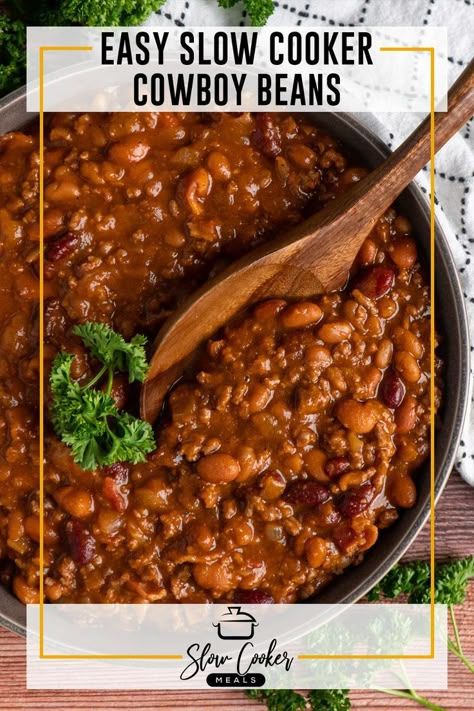 Cowboy beans in bowl with a wooden spoon. Ground Beef In Crockpot, Slow Cooker Cowboy Beans, Easy Potluck Side Dishes, Ground Beef And Beans, Beans With Ground Beef, Baked Bean Casserole, Beans Recipe Crockpot, Beef And Beans, Slow Cooker Bbq Beef