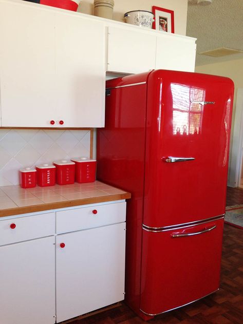 Elizabeth's red and white kitchen and laundry room - divine! Red Vintage Refrigerator, Red Accents In Kitchen, Red Cabinets Kitchen, Garcia House, Grey Tile Kitchen Floor, Red Fridge, Red Mercedes, Cowboy Wallpaper, Red Refrigerator