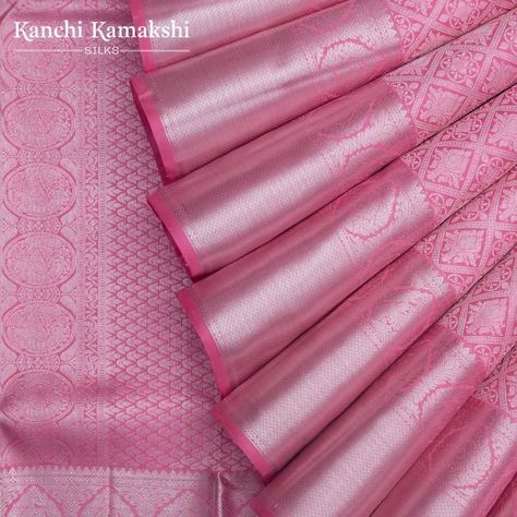 Enchantingly pretty silver zari criss cross windowpane checks nestling floral buttas lends regalia to this Pastel Pink Kanchipuram Silk Saree. The enamoringly elegant weave is complemented with a self silver zari border with temples, arrow series peacocks nestling floral drop buttas and criss cross brocade. The opulent self silver zari pallu enchants with peacock chakras and floral brocade.    . . . . #Silverzarisaree #Silverzari #Kanchisilk #Kanchipuramsilk  #sareelover #weavesofindia #sareeadd Baby Pink Kanjeevaram Saree, Pastel Pink Kanchipuram Saree, Baby Pink Pattu Saree, Silver Zari Saree Silk, Pastel Pink Saree Silk, Pastel Kanchipuram Saree, Baby Pink Silk Saree, Pastel Silk Saree, Silver Border Saree