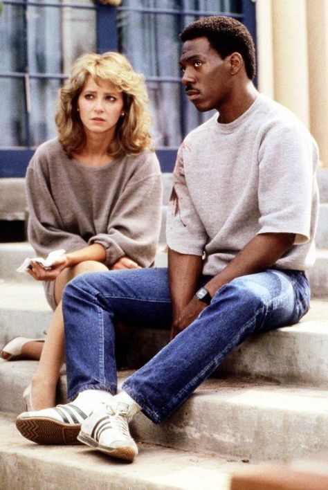 Lisa Eilbacher and Eddie Murphy in Beverly Hills Cop (1984) Eddie Murphy Beverly Hills Cop, Lisa Eilbacher, Beverly Hills Cop Movie, Axel Foley, Cop Outfit, 80's Movies, Movie Board, Beverly Hills Cop, Ingmar Bergman