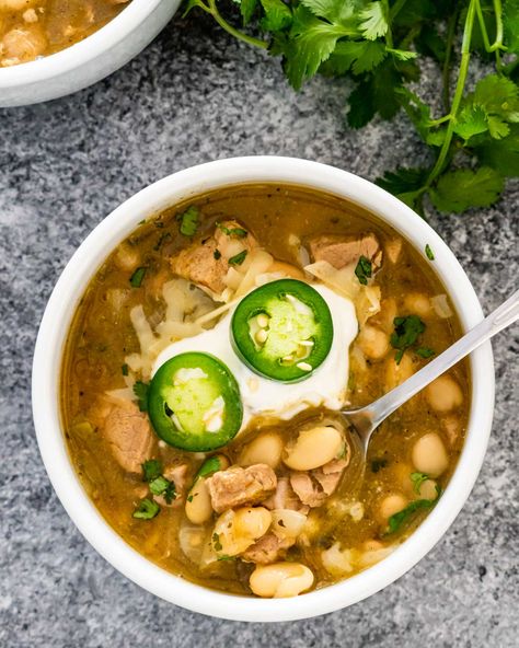 This Chili Verde with white beans and pork is a favorite and easy chili-style recipe. Pork tenderloin is slowly cooked with chilis, green enchilada sauce and many spices. A delicious Mexican-style dish! #chiliverde #pork #chili #recipe Pork Chili Verde Recipe, Crockpot Pork Carnitas, Creamy White Chicken Chili Recipe, Chili Verde Recipe, Chili Verde Pork, Beans In Crockpot, Pork Chili, Chili Verde, Crockpot White Chicken Chili