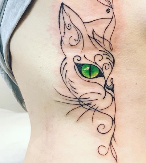 A minimalistic, linework cat tattoo done by @jenskinart! Love the green in the eyes, and the fine lines that were used to make half of a cat face! Half Cat Face Tattoo, Cat Eye Tattoos, Cat Face Tattoos, Cat Outline Tattoo, Minimalist Tattoo Design, Cat Paw Tattoos, Cat And Dog Tattoo, Watercolor Tattoo Ideas, Minimalistic Tattoos