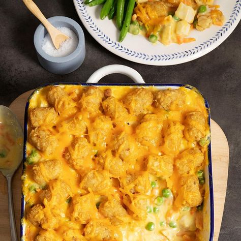 Easy chicken Tater Tot casserole is like chicken pot pie topped with tots. Our recipe calls for mostly frozen ingredients, so it's super quick to prep. Tater Tot Casseroles, Cheesy Meals, Comforting Recipes, Ryan Jones, Chicken Tater Tot Casserole, Tater Tot Recipes, Hotdish Recipes, Tot Casserole, Cheesy Casserole