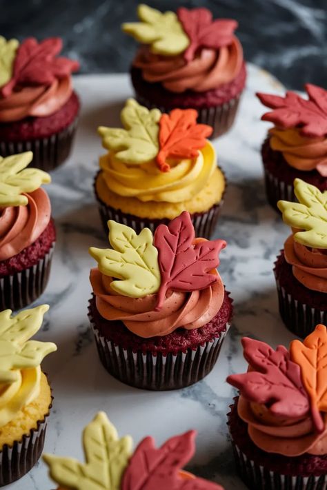 A photo of a  Fall Leaves Cupcakes a cute thanksgiving cupcakes Thanksgiving Brownies Decorations, Elegant Thanksgiving Cupcakes, Fall Wedding Cupcakes Ideas Simple, Thanksgiving Desserts Fancy, Creative Thanksgiving Desserts, Traditional Thanksgiving Desserts, November Cupcakes, Scarecrow Cupcakes, Fall Cupcake Designs