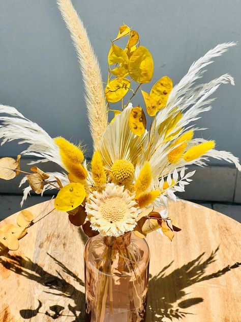 "Gorgeous Yellow Boho Dried Flower Bouquet with Glass Vase Flower Bouquet Approx. 12\" Tall. Bouquet features pampas grass, bunny tails, spear fans and italian white ruscus. Flowers may vary based on market availability, handmade to order, no refunds. Blush vibes will take over your home when you decorate using our Pink Bottle Glass Vase! This glass vase has a cylindrical bottle shape with a short neck and a lipped opening. Its color will accentuate these dry flowers! Set it out on your mantel o Sunflowers And Pampas, Yellow Boho Wedding, Tall Bouquet, Pampas Grass Burnt Orange Bouquet, Dried Flower Arrangements Orange, Yellow Pampas, Grass Arrangements, Boho Event, White Ruscus