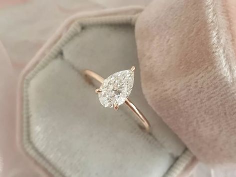 37 Pear Shaped Engagement Rings We're Obsessed With Rose Gold Pear Engagement Ring, Pear Rings, Pear Moissanite Engagement Ring, Solitaire Wedding Ring, Cute Engagement Rings, Future Engagement Rings, Pear Ring, Mohs Scale, Pear Shaped Engagement Rings