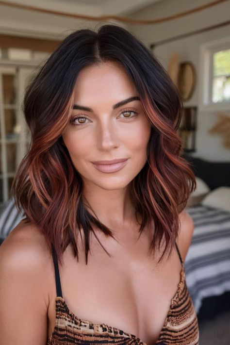 This fall haircut showcases a layered lob with rich copper balayage highlights, adding warmth and depth to your hair. The subtle waves enhance texture, making it perfect for those seeking a natural yet striking autumn look. Ideal for medium-length hair, this style offers a chic and effortless transition into the cooler months. Hair Color Ideas For Brunettes Red Ombre, Short Brunette Balayage Hair With Bangs, Dark Copper Balayage Brunette Straight Hair, Balayage Hair Medium Brown, Tan With Dark Hair, Two Tone Bob Hairstyles, Chocolate And Caramel Balayage, Fall Mid Length Hair Colors, Hair Color Ideas For Brunettes Copper