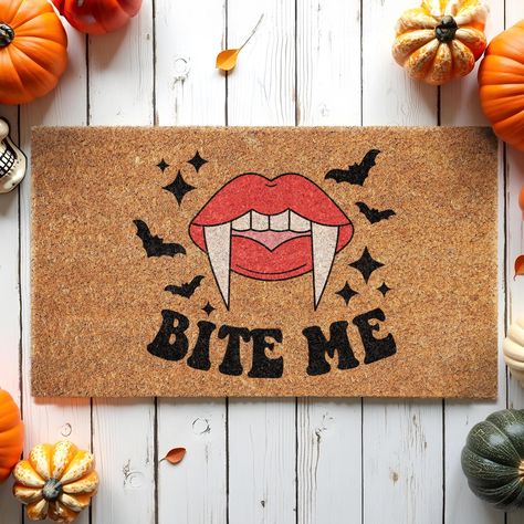 Happy Halloween, Bite Me, Coir Door Mat, Welcome Mat, Front Door Mat, Outdoor Mats, Bite Me, Doormat Fall Mats Halloween Decor Mats, Bite Me Welcome to our store! Our doormat is made with high-quality natural coir with backs that are made with slip-resistant PVC rubber backing. All mats are printed with UV-resistant ink so that they last long under all weather conditions. Our doormat is the perfect long-lasting gift for your loved ones. Made from 100% coir, this rectangular doormat helps keep your space clean, while the backing material helps prevent it from slipping or sliding. Our doormat is made of 0.5in thick coconut coir fiber, the material easily captures moisture, dirt, and other particles, to trap the bristles of absorbent coconut shell fiber in the dirt, so you can wipe your feet Halloween Door Mat Painting, Halloween Door Mats Diy, Diy Halloween Mat, Halloween Door Mat Diy, Halloween Door Mats, Front Door Mat Outdoor, Halloween Bites, Welcome Mat Front Door, Halloween Diy Door