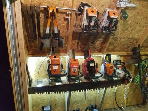 Diy Chainsaw Storage, Chain Storage Ideas, Saw Storage Ideas, Chain Saw Storage, Chainsaw Storage Ideas, Chainsaw Rack, Chainsaw Mount, Chainsaw Storage, Lawn Equipment Storage