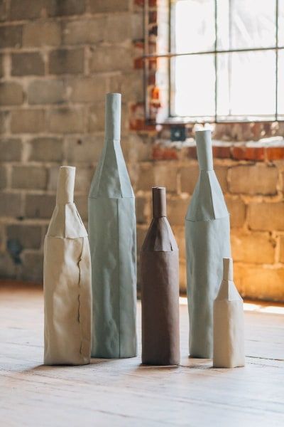 Fall Art Trends: Prairie Art | Domino Cabinet Decor Ideas, Kitchen Cabinet Decor, Prairie Art, Clay Bottle, Organic Cake, Classic White Kitchen, Best Kitchen Cabinets, White Pitcher, Kitchen Cabinets Decor