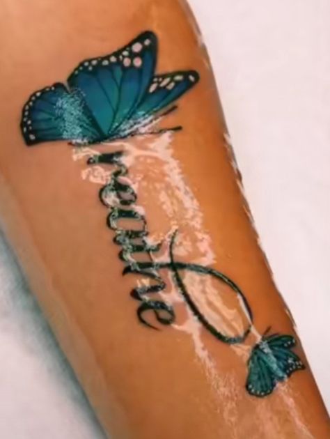 Blue Ink Tattoos Black Women, Ambre Nails, Blue Ink Tattoos, Blue Butterfly Tattoo, Teal Butterfly, Cross Tattoo Designs, Blue Tattoo, Dope Tattoos For Women, Tattoo Bracelet