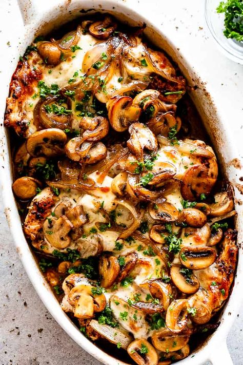 Cheesy Baked Chicken with Mushrooms - An easy recipe for baked chicken breasts covered in melty mozzarella cheese and layered with deliciously caramelized mushrooms. This effortless chicken dish is a great dinner for any night of the week. #bakedchicken #chickenrecipes #mushrooms #cheese #lowcarb #ketorecipes Baked Chicken With Mushrooms, Baked Chicken And Mushrooms, Chicken Breast Dishes, Cheesy Baked Chicken, Chicken With Mushrooms, Baked Chicken Breasts, Dada Ayam, Baked Chicken Breast, Easy Cheesy