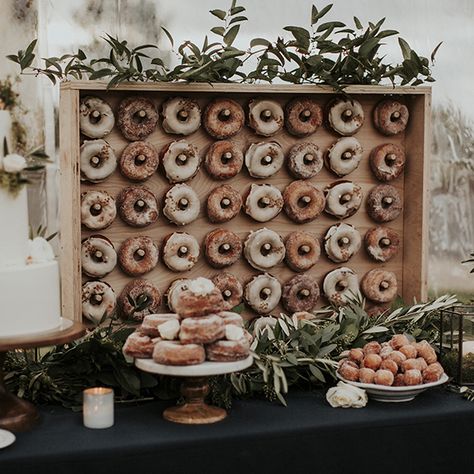 Our natural wood donut wall holds 48 regular sized donuts and is a perfect statement piece on your dessert table! Rents for $75 Apple Cider Donuts Wedding, Cider Donuts Wedding, Fall Wedding Donut Bar, Donuts Wall Wedding, Donut Holes Wedding Display, Rustic Donut Wall, Donut Pegboard Wedding, Donut Wall Wedding, Diy Dessert Table