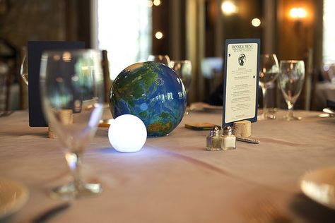 Planets make perfect centerpieces. | 21 Stellar Ideas For An Astronomy-Themed Wedding Space Theme Bridal Shower Ideas, Space Wedding Theme, Planet Wedding, Space Themed Wedding, Theme Bridal Shower Ideas, Astronomy Wedding, Star Themed Wedding, Non Floral Centerpieces, Puzzle Guest Book