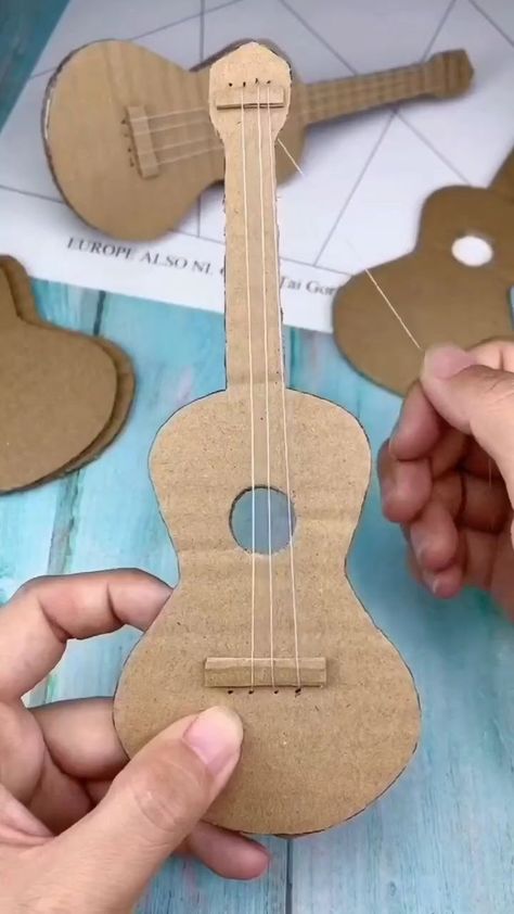 Paper Musical Instruments, What To Make Out Of Toilet Rolls, Christmas Toy Handmade, Diy Kids Instruments, Easy Instruments To Make, Cardboard Toys Diy, Music Instruments Crafts For Kids, Guitar Crafts For Kids, Diy Instruments For Kids