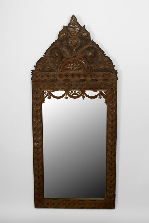 Mexican (1920s) brass wall mirror over an ebonized wood frame with a lattice design border and a swag motif with a pediment top Price $12,000.00 Punched Tin Patterns, Mirror Decor Ideas, Mexican Furniture, Tin Mirrors, Ebonized Wood, Metal Wall Mirror, Mexican Wall, Antique Mirrors, Vintage Mirror Wall