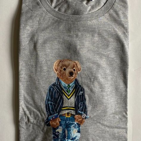 100% Authentic Mens Polo Ralph Lauren Polo Bear Long Sleeve Crewneck T-Shirt (Msrp $65). This Shirt Is Brand New With Tags! On This Cotton T-Shirt, Ralph Lauren's Iconic Mascot Sports A Polo Blazer And Bright Corduroy Pants. Ribbed Crewneck Polo Bear Icon And "Polo Bear By Raph Lauren" Printed At Center Front Short Sleeves Even-Sewn Hem 100% Cotton Measurements: Armpit To Armpit Is 27 Inches And The Length Is 31 Inches. Polo Bear Sweater Outfit, Polo Teddy Bear, Polo Teddy Bear Sweater, Raph Lauren, Ralph Lauren Preppy, Bear Icon, Polo Ralph Lauren Bear T Shirts, Polo Bear Ralph Lauren, Ralph Lauren Polo Bear