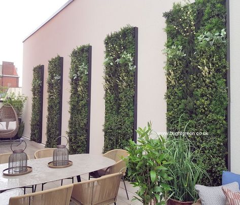 Custom Made set of Artificial Outdoor Living Wall Panels manufactured and installed in a courtyard location Artificial Foliage Wall Garden, Fake Green Wall Bathroom, Artificial Living Wall Outdoor, Artificial Plant Wall Outdoor, Fake Living Wall, Artificial Living Wall, Spanish Patio, Living Wall Garden, Green Wall Garden