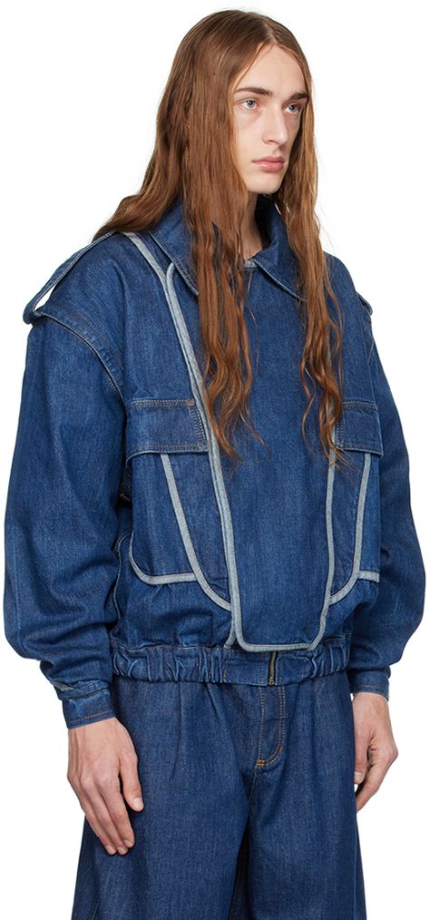 Non-stretch denim jacket. · Spread collar · Zip closure with press-stud placket · Flap pockets · Elasticized hem · Epaulets · Detachable sleeves · Press-stud barrel cuffs · Contrast stitching in tan Supplier color: Dark blue jeans Utility Denim Jacket With Flap Pockets For Streetwear, Unstructured Blue Denim Jacket With Pockets, Collared Denim Jacket With Flap Pockets For Streetwear, Unstructured Denim Jacket With Pockets, Unstructured Button-up Denim Jacket, Detachable Sleeves, Dark Blue Jeans, Utility Jacket, Beach Wears