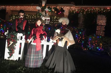 Homemade Christmas Carolers  PVC bodies, tomato cages for skirts,  Christmas tree skirt tops and thrift store shopping for skirts and jacket. Styrofoam wig heads painted with faces and creative made hats. We added music at night and quite fun for passerby’s. Photo opt for many walkers. Diy Outdoor Christmas Carolers, Christmas Carolers Decorations Diy, Christmas Carolers Decorations, Music At Night, Wig Heads, Christmas Exterior, Christmas Carolers, Skirt Tops, Thrift Store Shopping